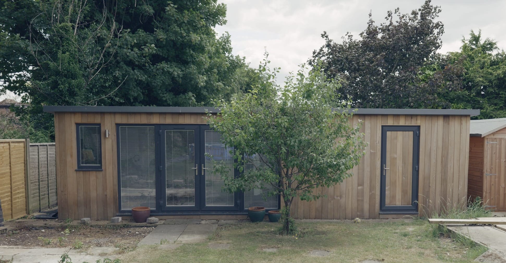 A photo of a garden studio
