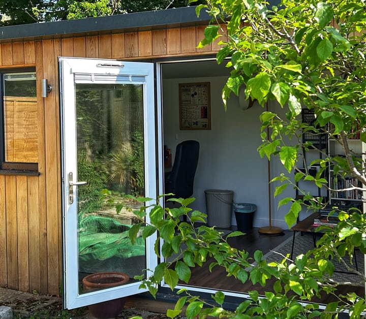 A photo of a garden studio