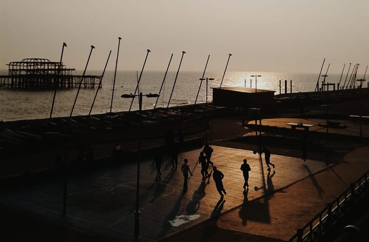 A photo of people playing Basketball on Brighton Beach
