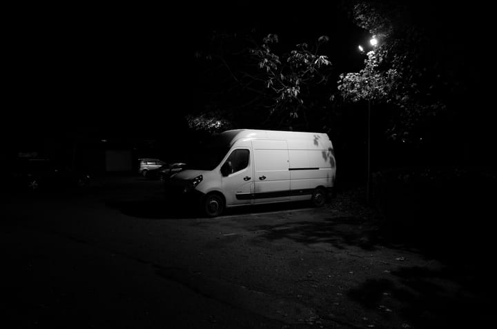 A photo of a van in a carpark