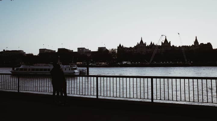 A photo of london skyline over the Thames River.
