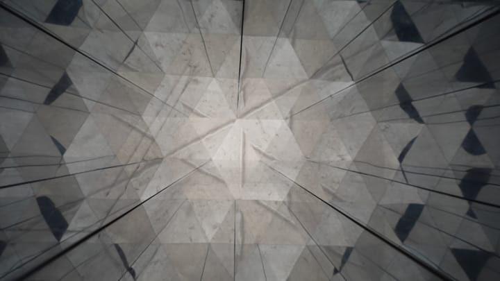 A photo of a reflection on reflection on reflection 