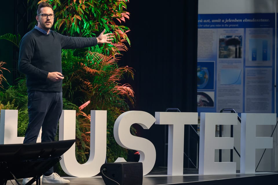 Rob Lambert on stage presenting