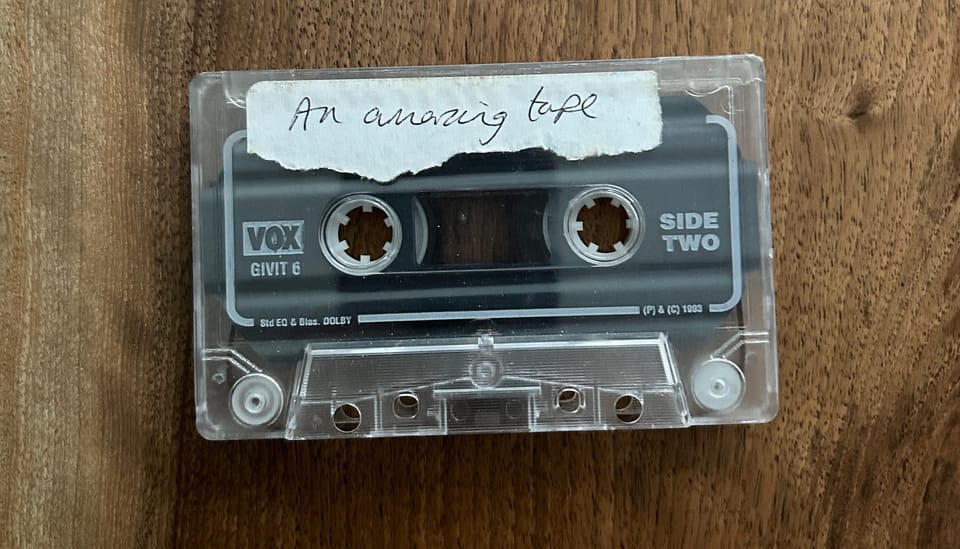A photograph of a cassette tape - high friction, high reward