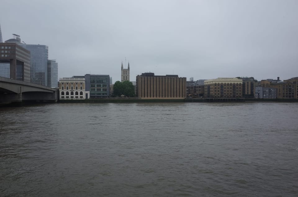 A photo of the River Thames with office buildings lining the sides