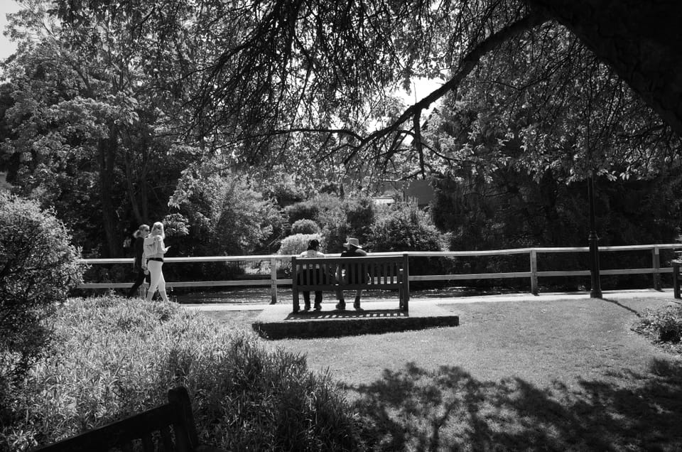 A photo of people on a Bench in Winchester